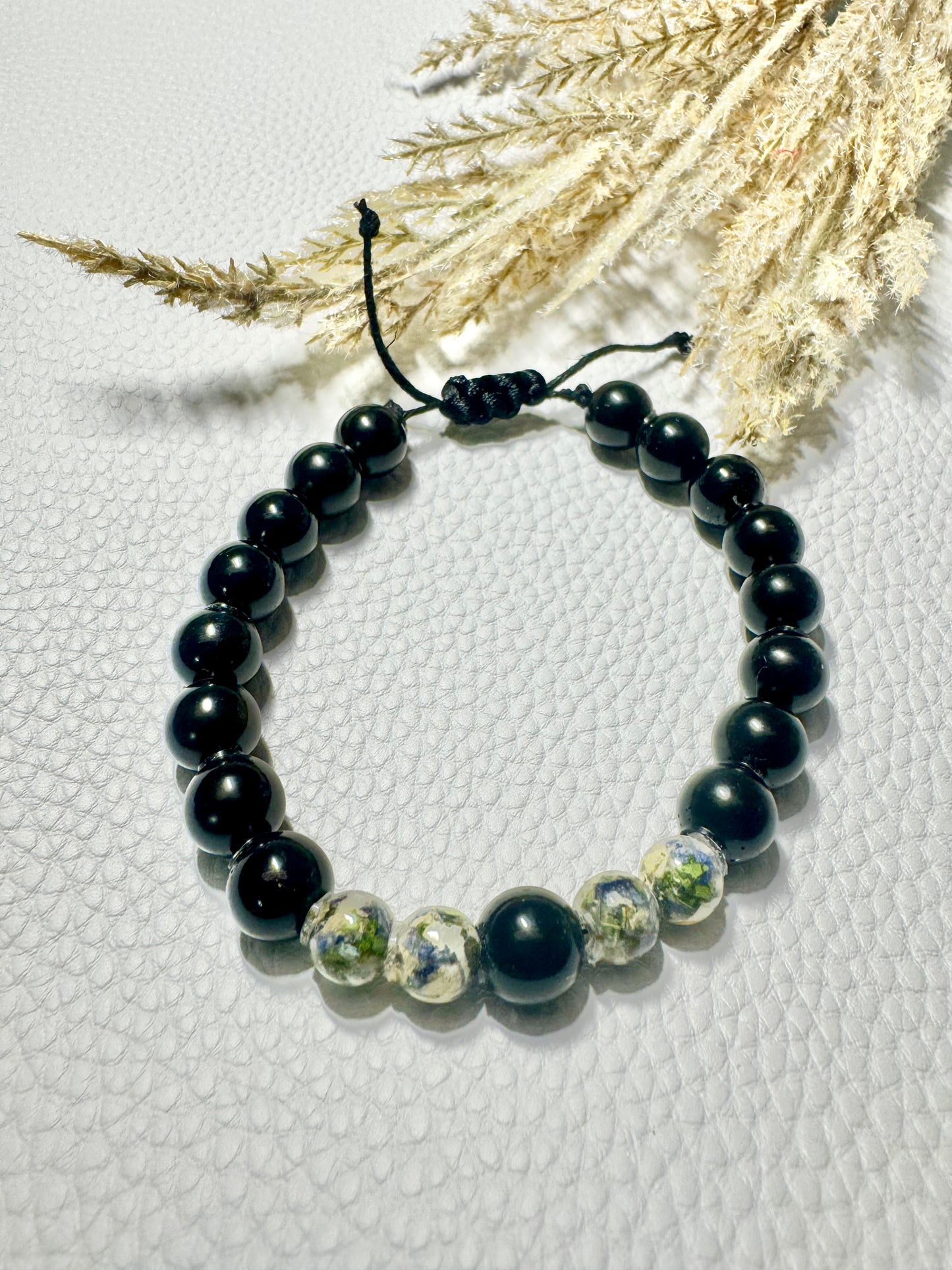 Beaded bracelet adjustable string