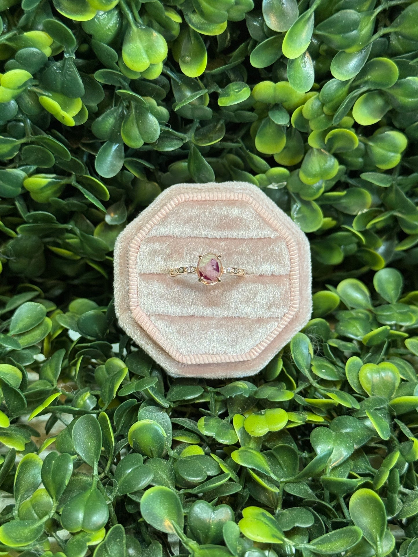 Oval ring with stones on the side